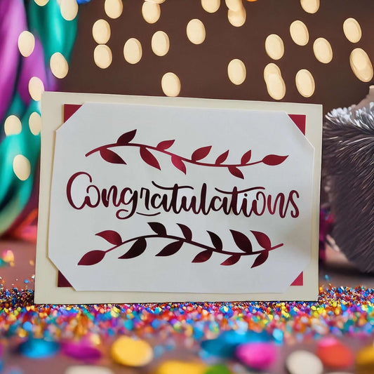 Congratulations Card with burgundy leaf design for graduation or new job celebration.