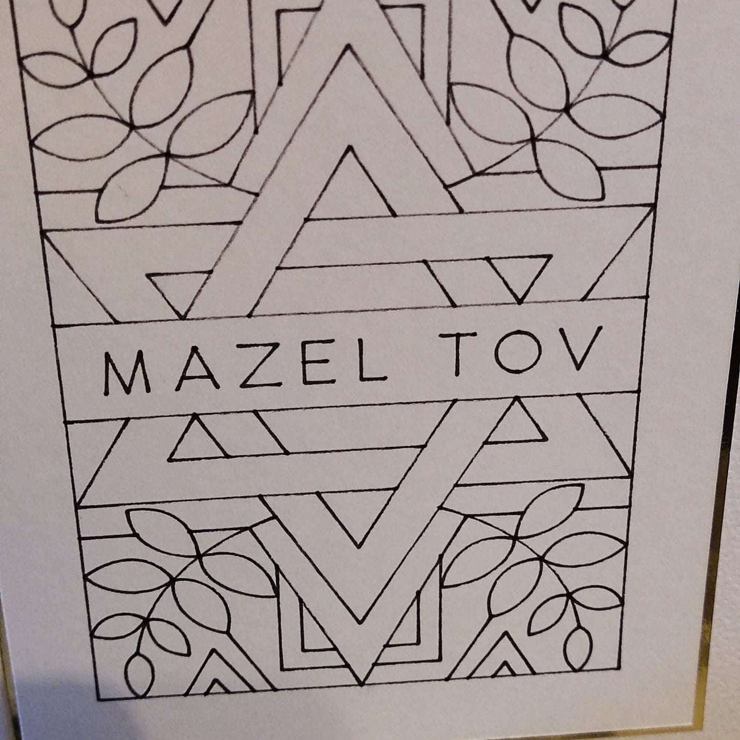 Black and white outline illustration of a Star of David with 'Mazel Tov' text, perfect for Jewish celebration cards.