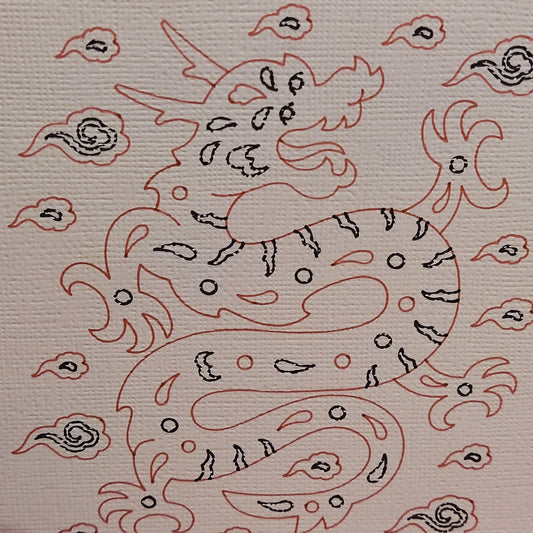 Illustration of a dragon surrounded by clouds, depicted in red and black on textured cardstock.