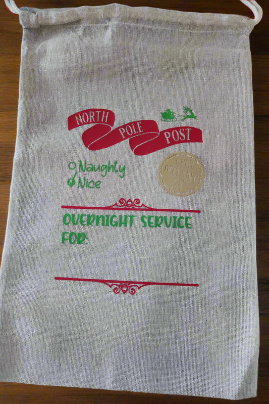 North Pole Santa Delivery Sack featuring 'Overnight Service For' design, ideal for personalised Christmas gifting.