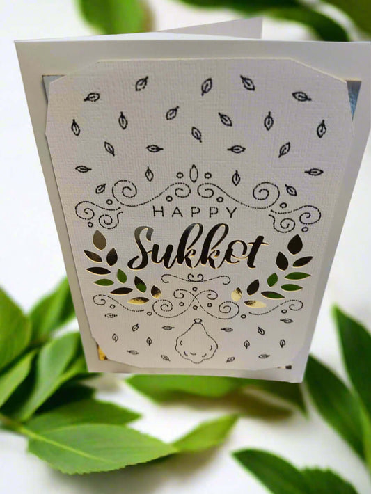 Handmade Happy Sukkot greeting card with intricate ink details and gold accents.