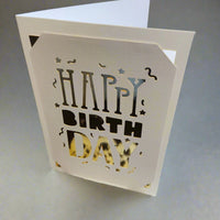 Open laser-cut "Happy Birthday" card holder.