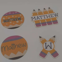 Personalised school name stickers featuring playful designs for kids' supplies.