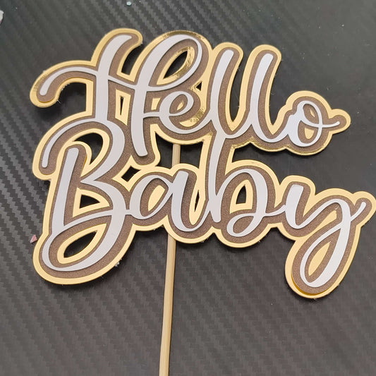 Hello Baby cake topper in gold layered cardstock design for baby shower celebrations.