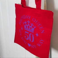 Bright red Birthday Queen 50 tote bag with crown design, perfect for celebrating a 50th birthday.