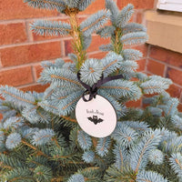 Black ribbon Halloween bauble with spooky bat and Trick or Treat text, custom name option.