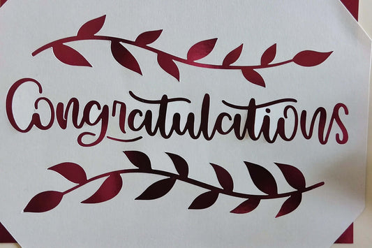 Congratulations card featuring burgundy leaf design, perfect for graduation or new job gifts.