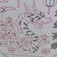 Illustration of a dragon design on a Chinese New Year card, featuring floral accents and traditional motifs.