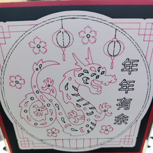 Illustration of a dragon design on a Chinese New Year card with lanterns and floral motifs.