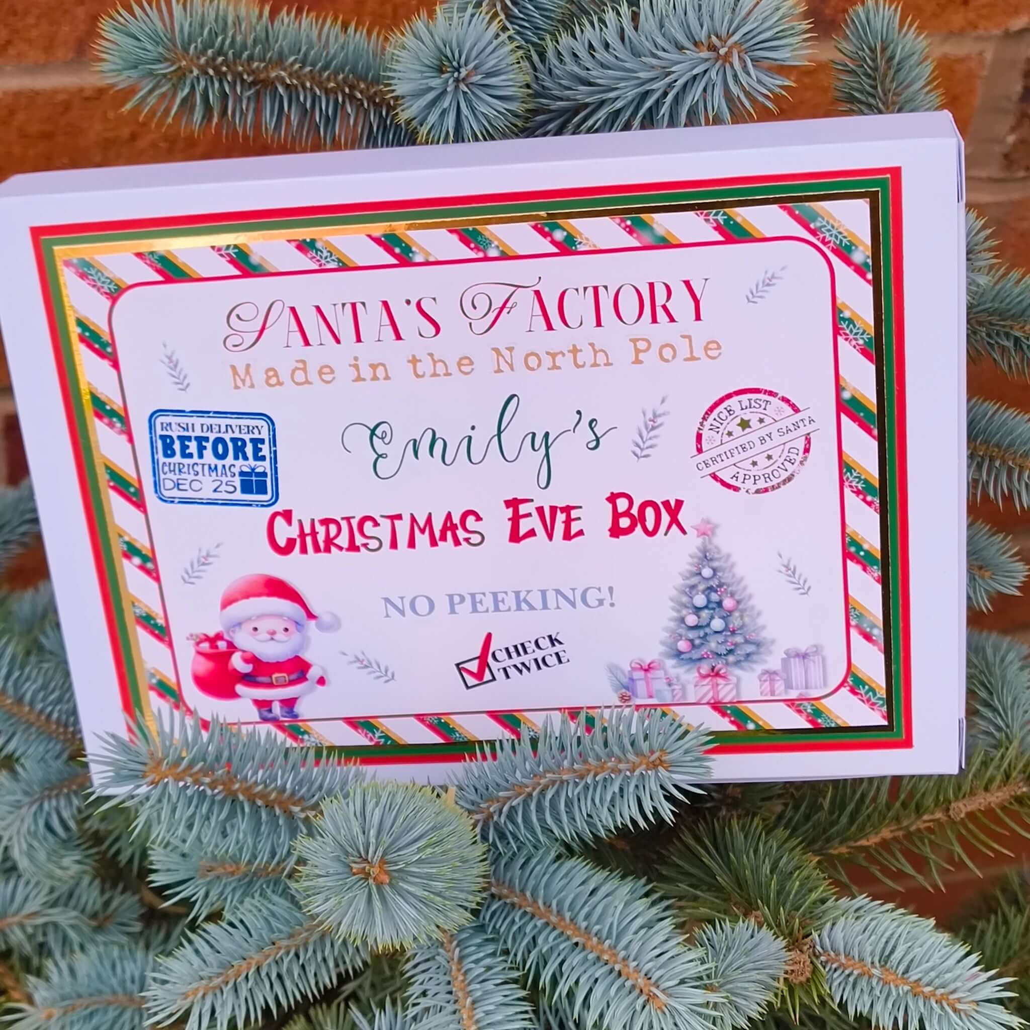 Personalised Christmas Eve box set with Santa's Factory label for kids' Christmas magic.