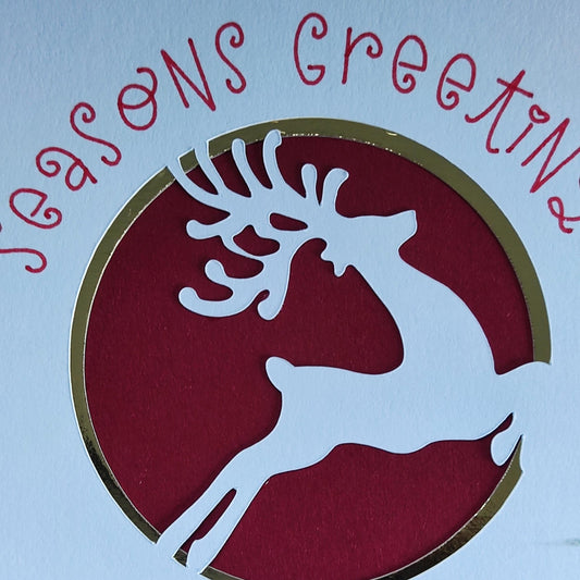 Handmade Christmas Money Holder Card with reindeer cut-out, gold foil accents, and "Seasons Greetings" text for festive cash gifts