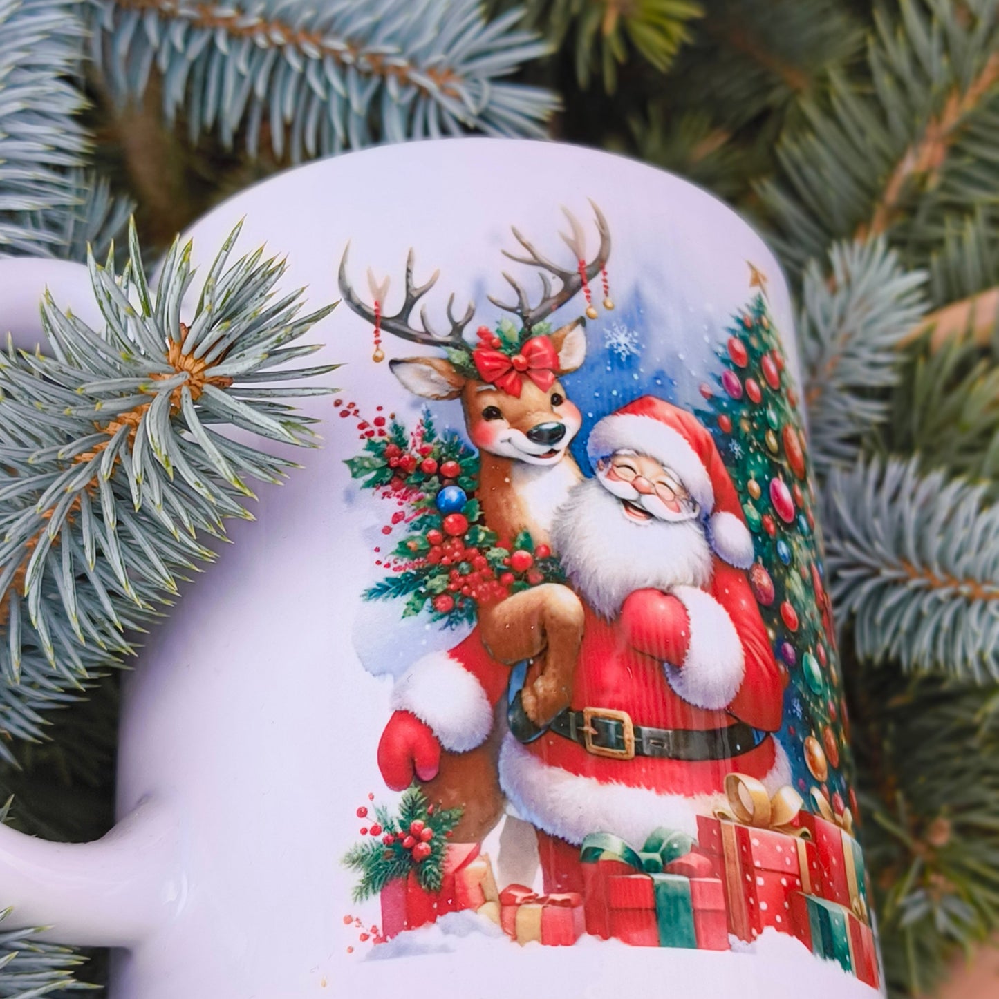 Close-up of Santa Claus and reindeer design on white Christmas mug, colourful holiday print with tree and gifts