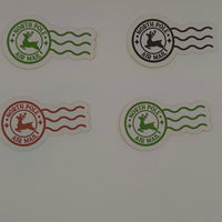 Four North Pole Air Mail stickers in red, green, and black with festive wavy designs