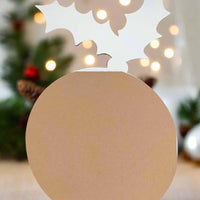 Back view of Christmas pudding-shaped place card, showing plain brown textured cardstock with white holly outline at the top, designed for standing upright on festive tables.