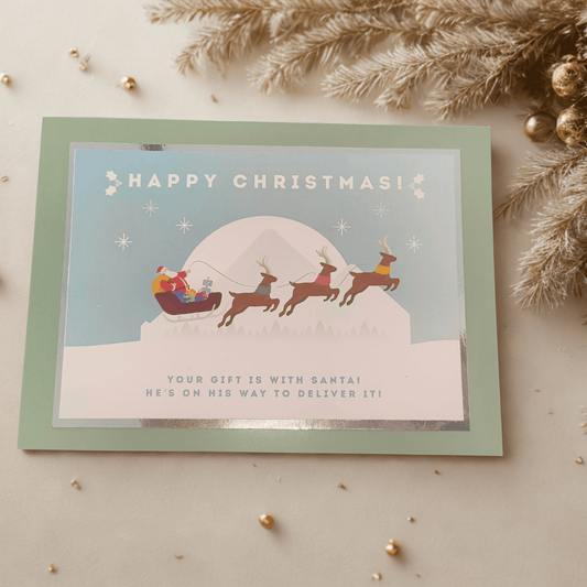 Personalized Christmas card featuring Santa with reindeer, ideal for festive holiday magic.