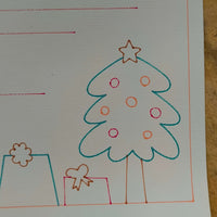 Illustrated Christmas tree and gifts on personalised Father Christmas letter template for kids.