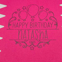 Personalised birthday crackers in vibrant pink with 'Happy Birthday Natasha' and balloon design.