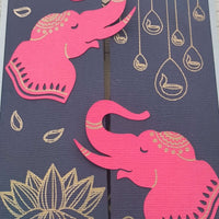 Handmade pink elephant Diwali card featuring intricate designs on navy background, perfect for celebrating the Festival of Lights.