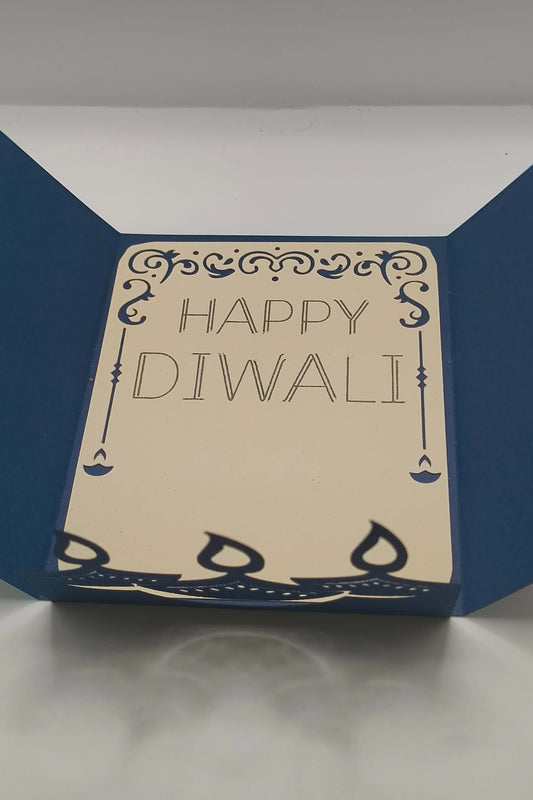 Handmade Diwali card with navy blue design and the greeting 'Happy Diwali' inside, perfect for festive celebrations.