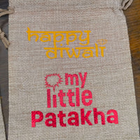 Personalised hessian Diwali gift bag with text 'Happy Diwali' and 'my little Patakha' in vibrant colors.