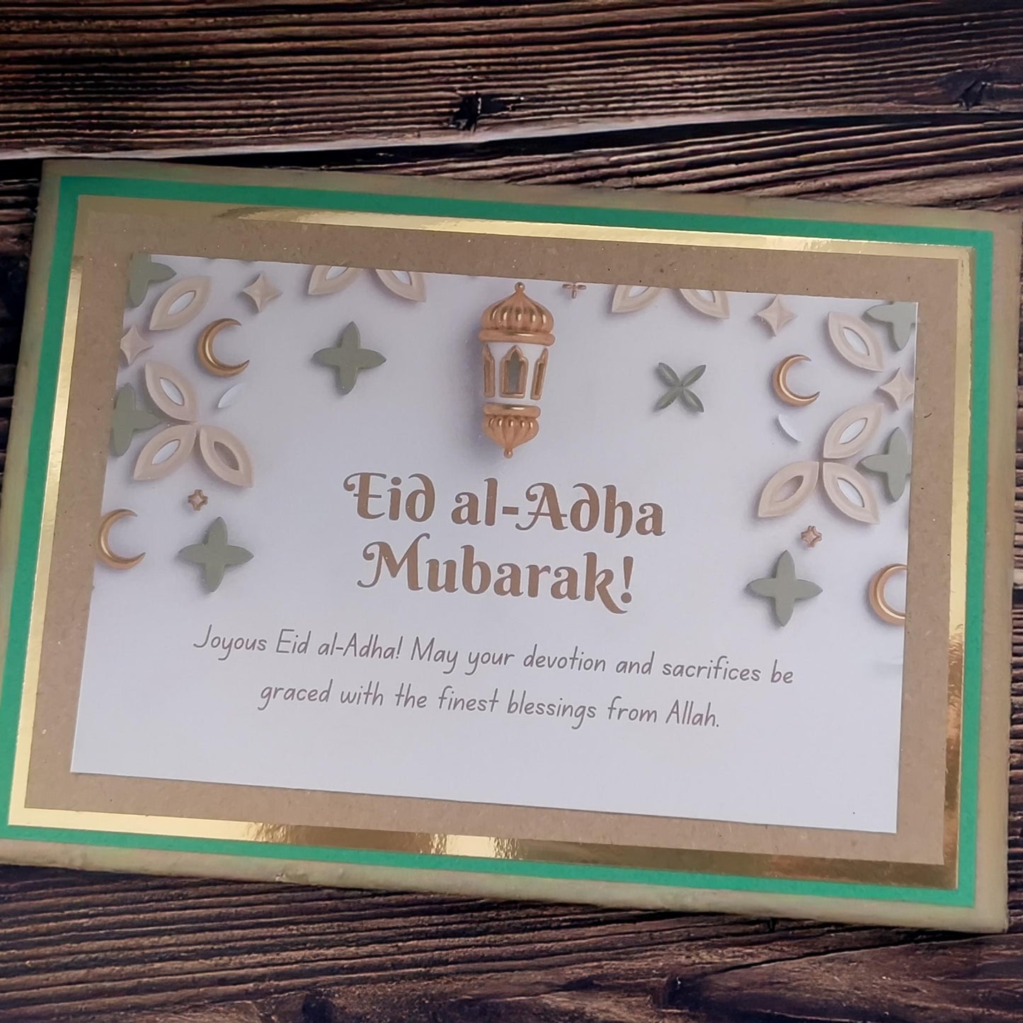 Elegant Eid al-Adha greeting card featuring gold accents and heartfelt message, perfect for sharing blessings.
