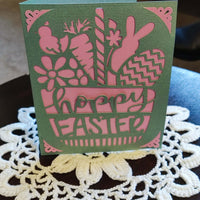 Handmade Easter greeting card in green and pink with bunny and spring designs, featuring 'Happy Easter' text.