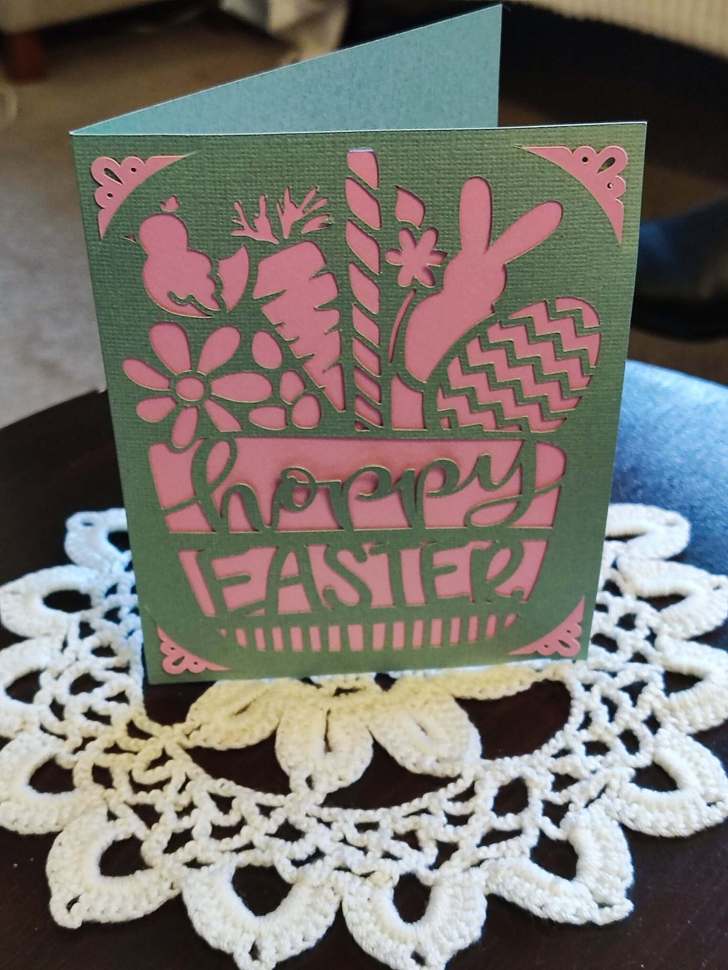 Handmade Easter greeting card in green and pink with bunny and spring designs, featuring 'Happy Easter' text.