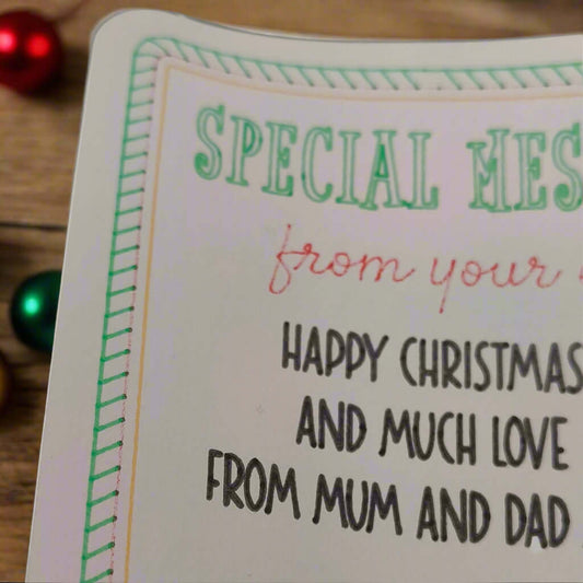 Elf Special Message Sticker with red and green festive border, holly sprig, and custom printed Christmas greeting from parents