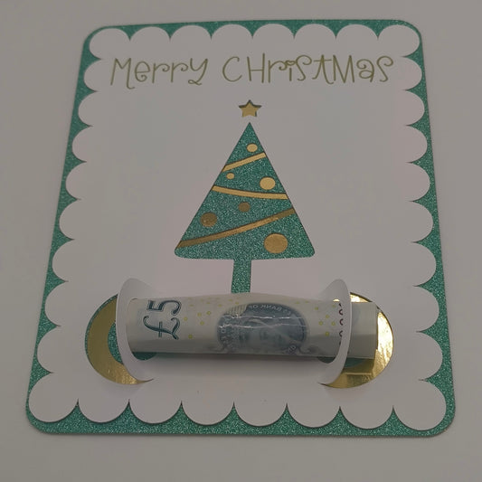 Festive money gift card with scalloped edges, glitter green Christmas tree, and gold accents, designed to hold rolled notes.