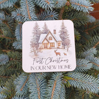 First Christmas New Home Coaster with a cottage and deer design, perfect for celebrating new home traditions.