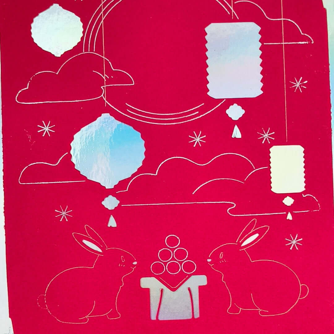 Handmade Mid-Autumn Festival card with red foil, moon rabbits, lanterns, and a celestial design.