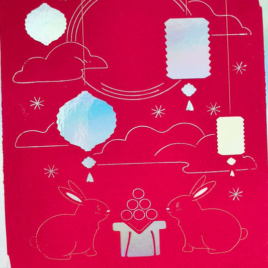 Handmade Mid-Autumn Festival card with red foil, moon rabbits, lanterns, and a celestial design.