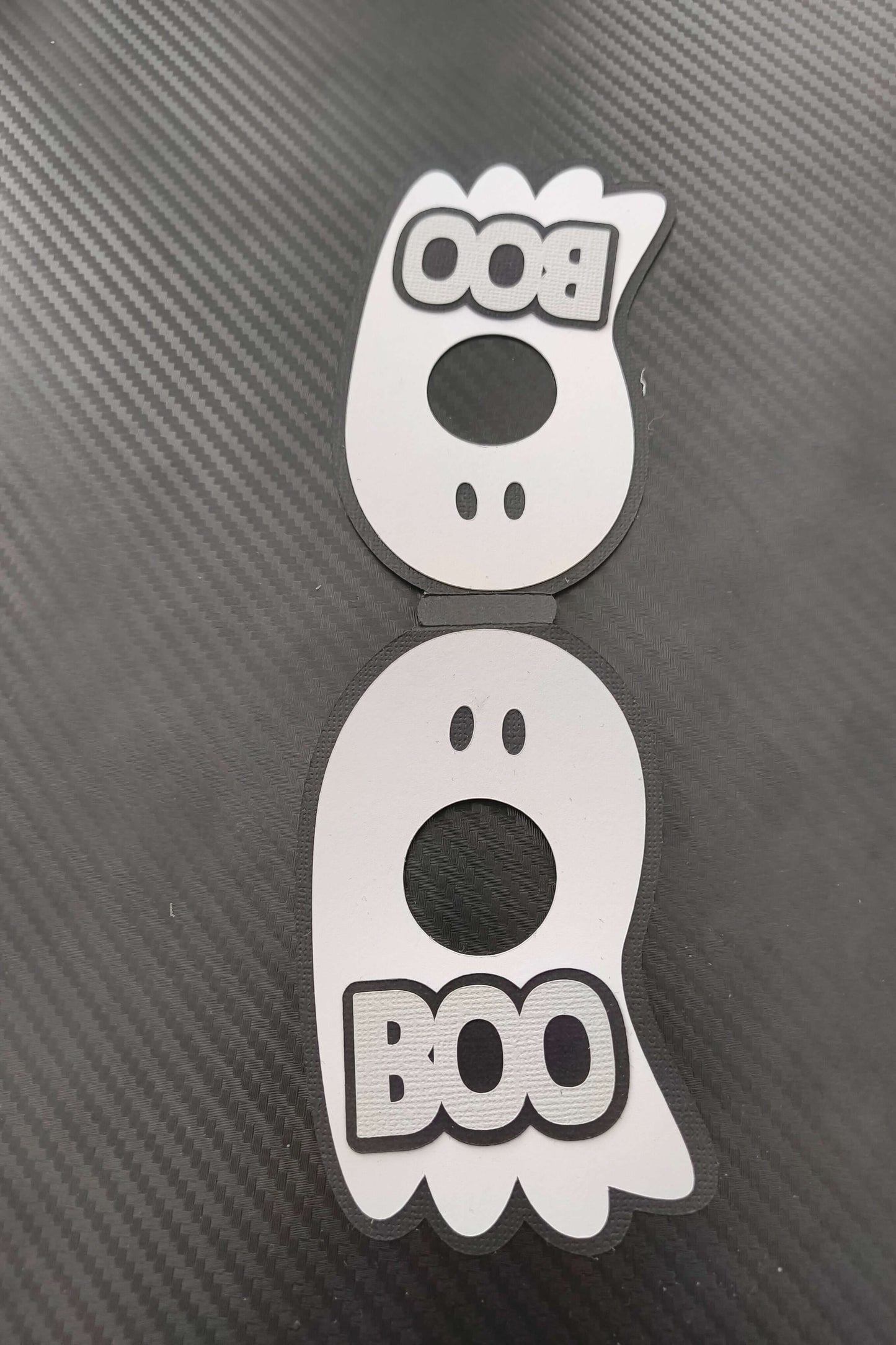 Two cute ghost-shaped Halloween tags with 'Boo' text, perfect for kids' treats and decorations.