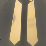 Close-up of graduation gift card holder featuring sophisticated black cardstock with shiny gold foil tie design for university celebrations