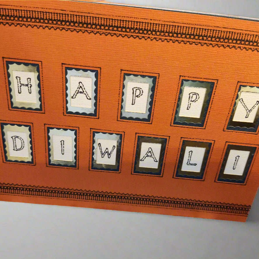 Handmade Happy Diwali card featuring colourful lettering and traditional design, perfect for the Festival of Lights.