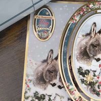 Handmade donkey Christmas card featuring a snowy scene and gold foiling for someone very special.