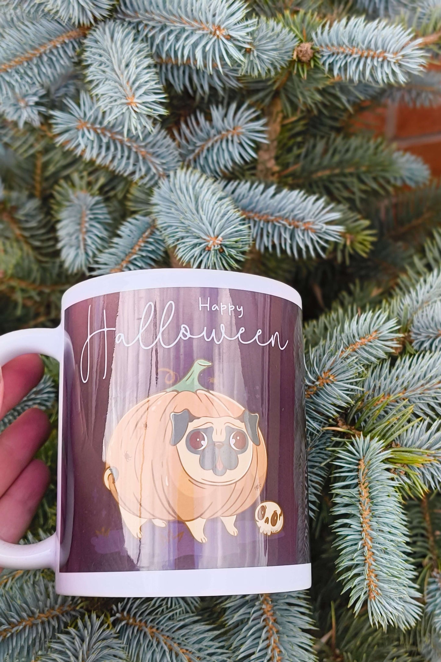 Happy Halloween mug featuring a cute pug dressed as a pumpkin on a dark purple background, perfect spooky season gift for dog lovers.
