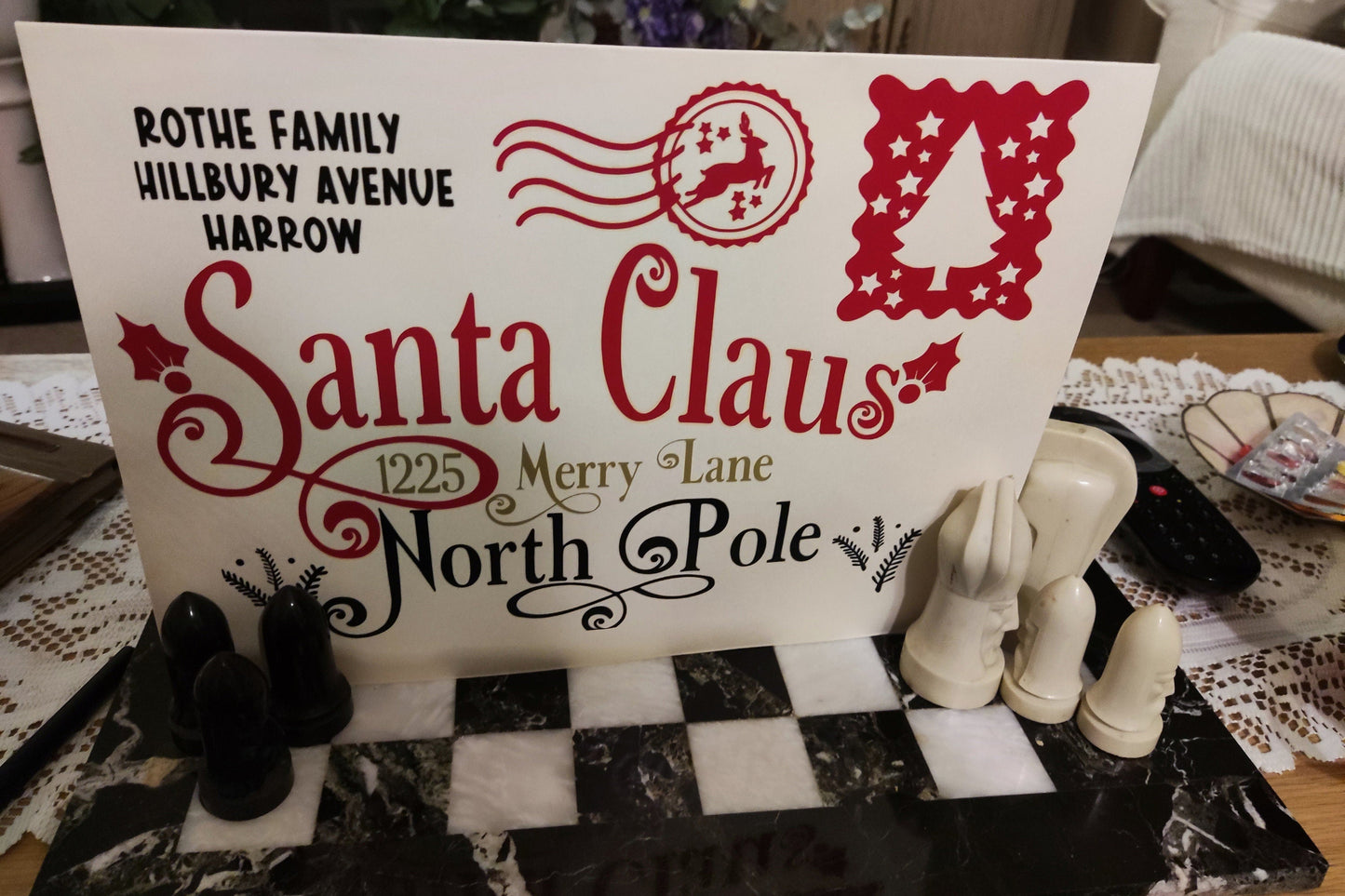 Personalised Santa Claus Envelope featuring family name and North Pole address design.