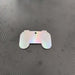 Personalised holographic gaming gift tag shaped like a game controller with the name 'CRAIG'