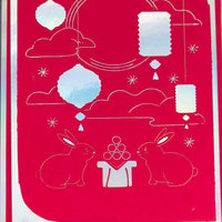 Handmade red foil Mid-Autumn Festival card featuring moon rabbits, lanterns, and a celestial backdrop.