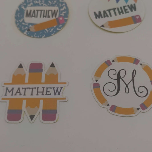 Personalised school name stickers featuring bright designs and the name Matthew on various styles.