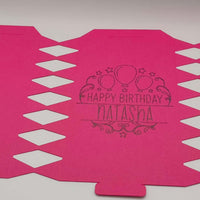 Personalised birthday crackers design in pink with 'Happy Birthday Natasha' printed.