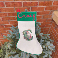 Personalised Vintage Santa Christmas Stocking with name Craig and initial C on a green cuff.
