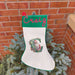 Personalised Vintage Santa Christmas Stocking with name Craig and initial C on a green cuff.