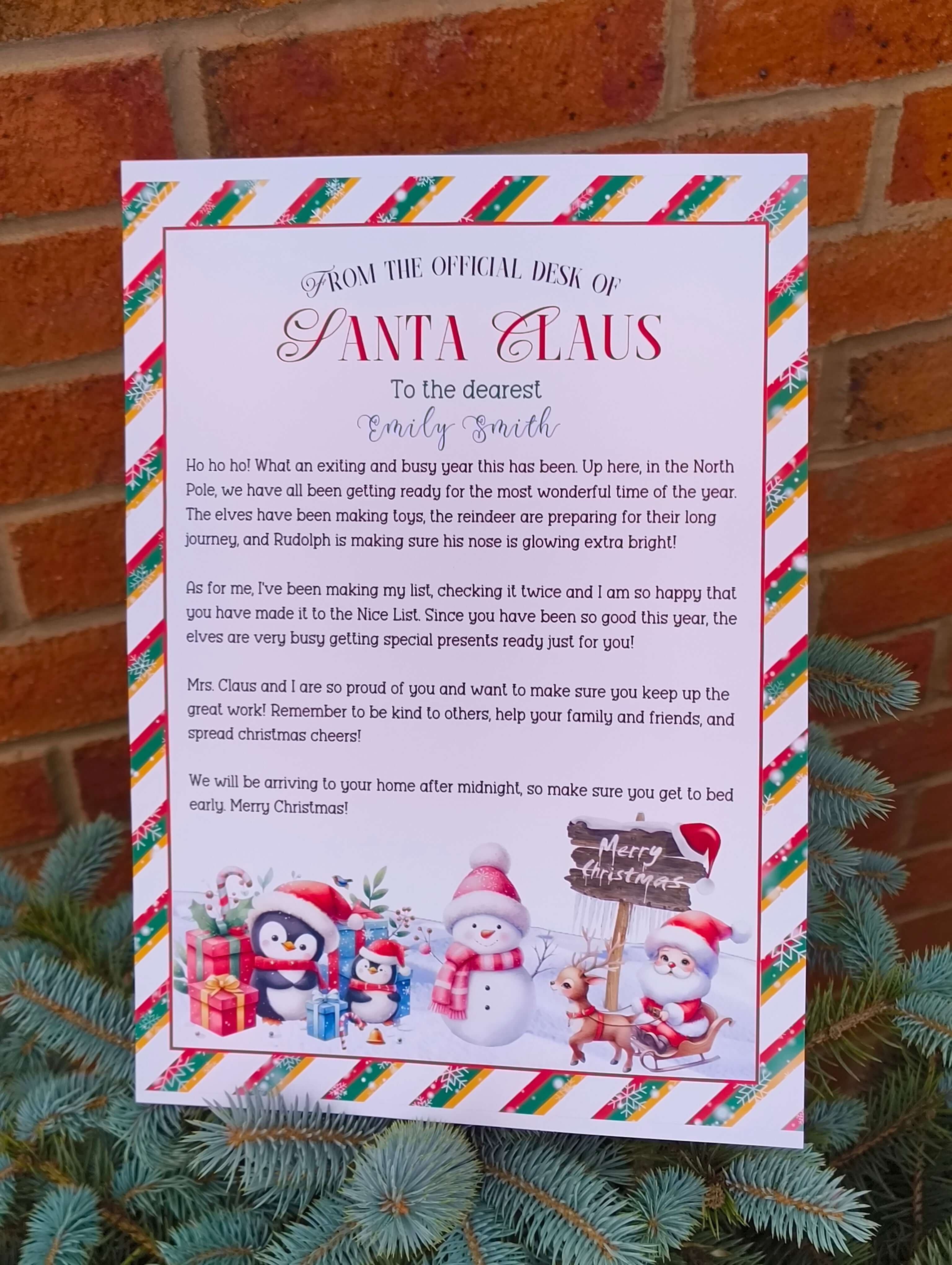 Personalised Letter from Santa Claus with Christmas border, festive snowman and penguin design, and a sweet message congratulating a child for being on the Nice List.