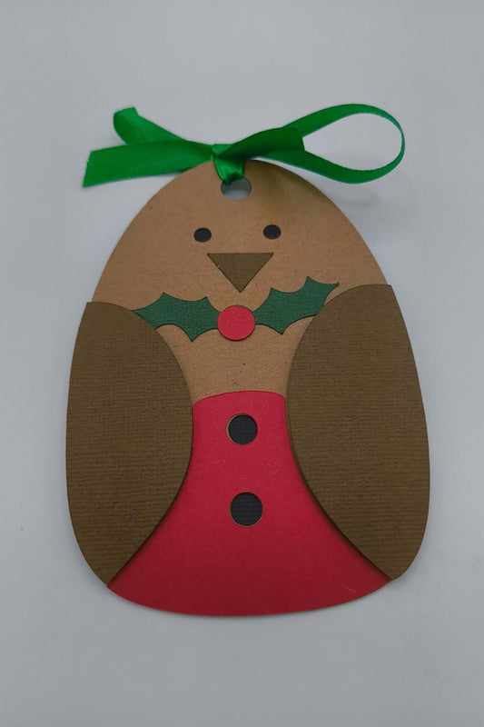 Handmade robin Christmas gift tag with green ribbon, ready to attach to presents.