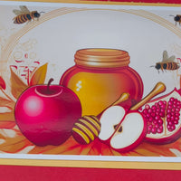 Rosh Hashanah card design featuring honey, apples, and pomegranates symbolising the Jewish New Year.
