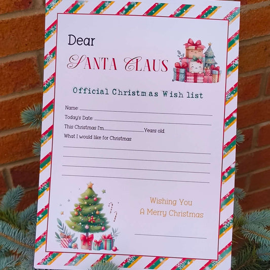 Official Christmas Wish List for Santa Claus featuring festive border, gift stack illustration, and space for children to write their name, age, and Christmas wishes.