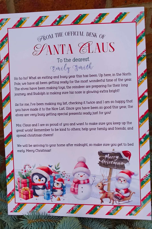 Letter from the desk of Santa Claus featuring penguins, snowmen, and reindeer artwork, personalised for a child named Emily Smith, printed on festive candy stripe bordered paper.