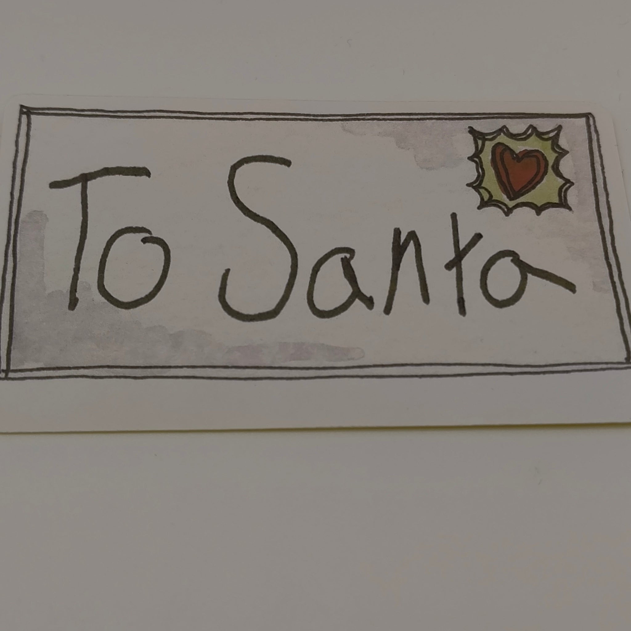 Single To Santa Christmas sticker with hand-drawn lettering and holly stamp